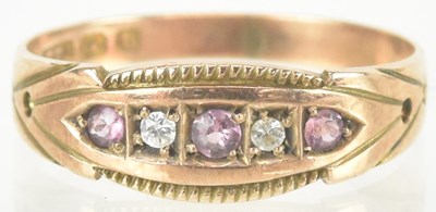 Lot 1530 - A 9ct rose gold ring set with pink and white...