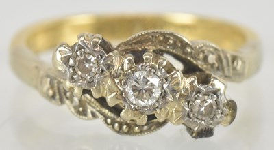 Lot 1463 - An 18ct gold ring with three illustion set...