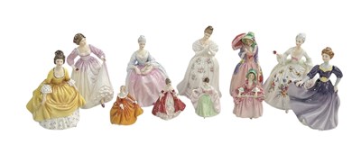 Lot 536 - ROYAL DOULTON; a group of eleven porcelain...