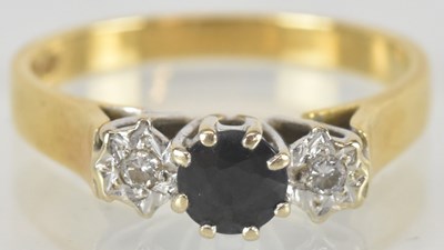 Lot 1430 - An 18ct gold ring, with central claw set...