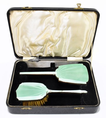 Lot 1196 - ADIE BROS; a cased George V hallmarked silver dressing table set