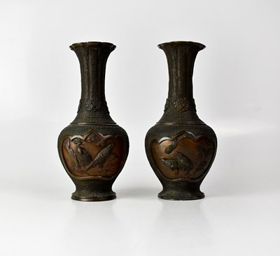 Lot 259 - A pair of Japanese bronze vases, each with two...