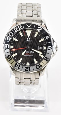 Lot 1642 - OMEGA; a gentleman's stainless steel GMT...