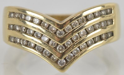 Lot 1449 - A 9ct gold diamond cluster ring in the form of...
