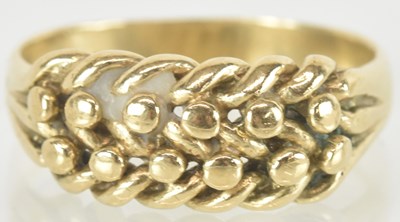 Lot 1448 - A 9ct gold beaded line ring, size T, approx 4.8g.