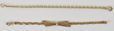 Lot 1412 - A 9ct gold flat woven bracelet, with lobster...