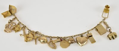 Lot 1377 - A 9ct gold charm bracelet with sixteen charms...