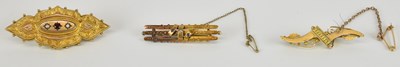 Lot 1390 - Three 9ct gold Victorian bar brooches, the...