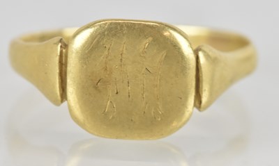 Lot 1453 - An 18ct gold signet ring, with rubbed initials...