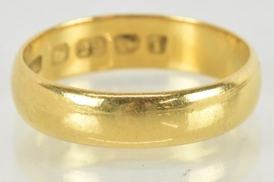 Lot 1455 - A 22ct gold band ring, size M, approx 3.5g.
