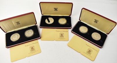 Lot 1604 - THE ROYAL MINT; three cased double silver coin...