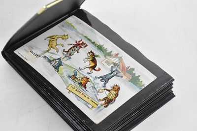Lot 359 - A collection of twenty-three Louis Wain...