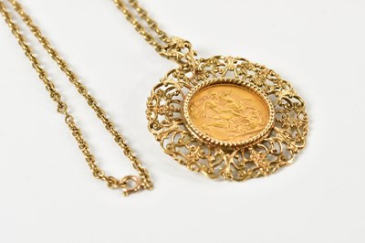 Lot 1593 - A George V 1913 full sovereign in 9ct yellow...