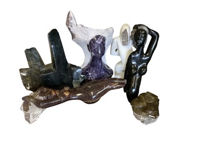 Lot 1015 - Six African carved stone figures including T...