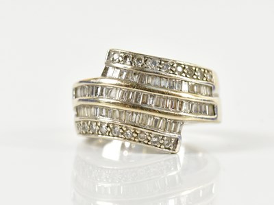 Lot 67 - An 18ct white gold diamond cocktail ring, set...