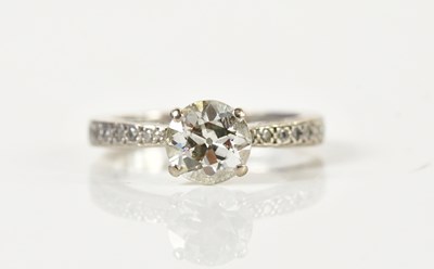 Lot 57 - An 18ct white gold diamond solitaire ring, the...