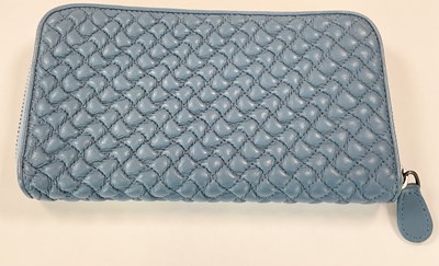 Lot 83 - BOTTEGA VENETA; a pale blue leather clutch bag,...
