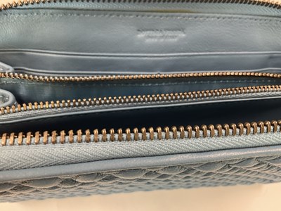 Lot 83 - BOTTEGA VENETA; a pale blue leather clutch bag,...