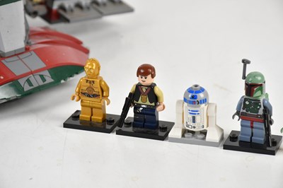 Lot 23 - STAR WARS; a Lego Star Wars Slave I ship,...