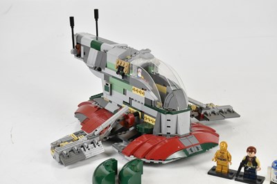 Lot 23 - STAR WARS; a Lego Star Wars Slave I ship,...