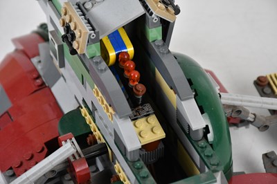 Lot 23 - STAR WARS; a Lego Star Wars Slave I ship,...
