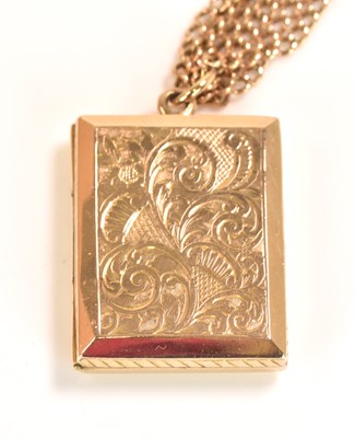Lot 536 - A 9ct yellow gold engraved rectangular locket...