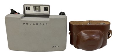 Lot 415 - KODAK; a Retinette leather cased camera and a...