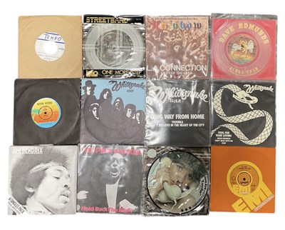 Lot 464 - A collection of twelve assorted vinyl singles...
