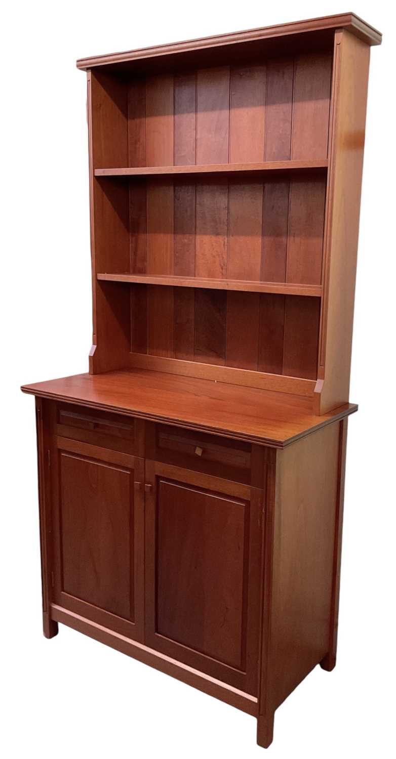 Lot 22 - PEARL DOT; a 1970s Brazilian mahogany bookcase,...