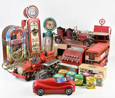 Lot 146 - A collection of tin display items and toys...