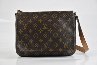 Lot 2018 - LOUIS VUITTON; a 2011 brown monogram Musette...