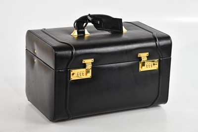 Lot 1936 - OCS ITALY; a black leather vanity case, with...