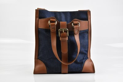 Lot 2083 - DOLCE & GABBANA; a blue denim and tan leather...