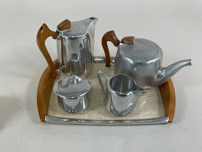 Lot 38 - Piquot ware tea set and tray, together with a...