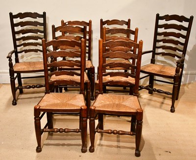 Lot 2453 - A set of six reproduction ladder back rush...