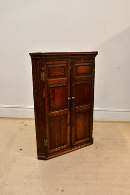 Lot 2285 - An 18th century oak crossbanded corner...