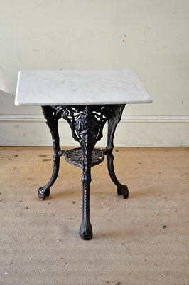 Lot 2479 - A cast iron table base, decorated with...