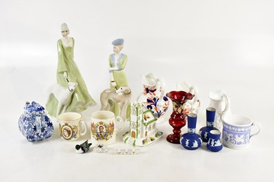 Lot 659 - ROYAL DOULTON; two large figures from the...