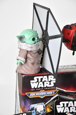 Lot 5 - STAR WARS; a collection of vehicles and...