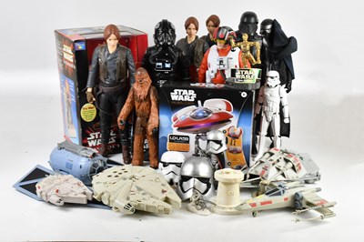 Lot 17 - STAR WARS; a collection of figures, including...
