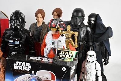 Lot 17 - STAR WARS; a collection of figures, including...