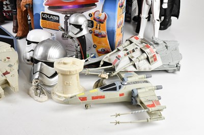 Lot 17 - STAR WARS; a collection of figures, including...