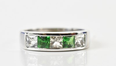 Lot 1376 - A white metal five stone dress ring set with...