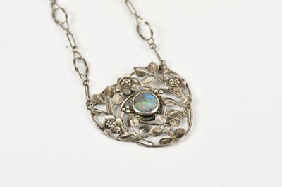 Lot 2077 - A white metal pendant on chain in the Arts and...