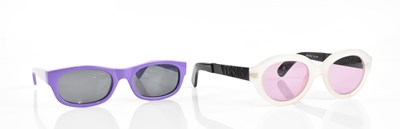 Lot 713 - VERSACE; a Versus Gianni Versace pair of white...
