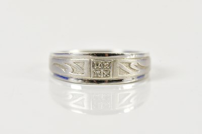 Lot 1499 - A 9ct white gold and diamond set dress ring,...