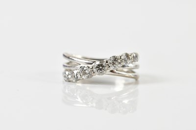Lot 76 - An 18ct white gold diamond set ring, with...