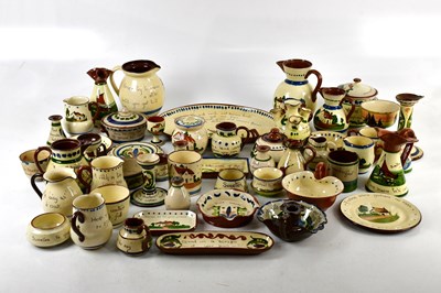 Lot 2802 - A large quantity of Devon motto ware including...
