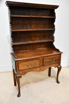 Lot 2385 - An early 20th century oak dresser, with...
