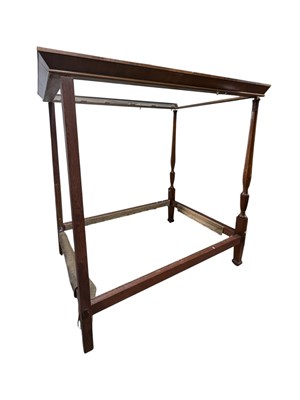Lot 2337 - A mahogany four poster bedstead.